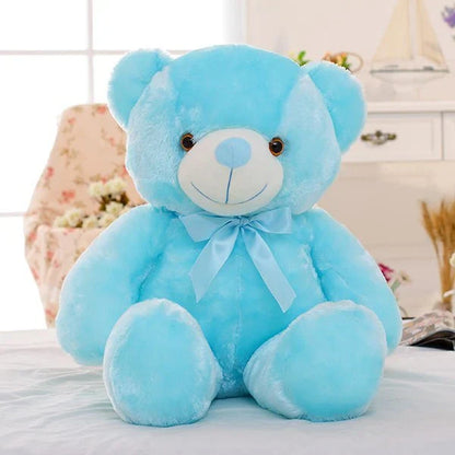 Colorful light-up plush teddy bear with over 7 changing LED colors, a cozy and unique Christmas gift for kids