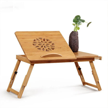 Foldable laptop bed desk with storage drawers and small fan, made from natural bamboo