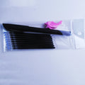 Automatic fading pen set showing blue refills, a plastic pen, and a storage holder.