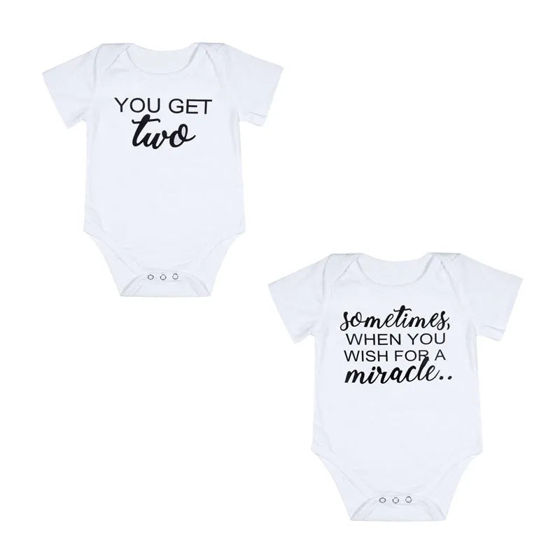 White baby jumpsuit romper with elasticated fit for infants and toddlers, sizes S to 3XL