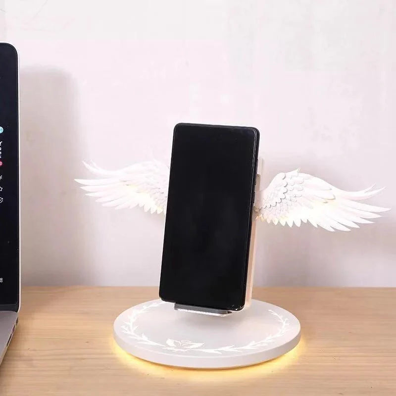 Angel Wings Wireless Charger with unfolding wings and aura base for fast 15W charging