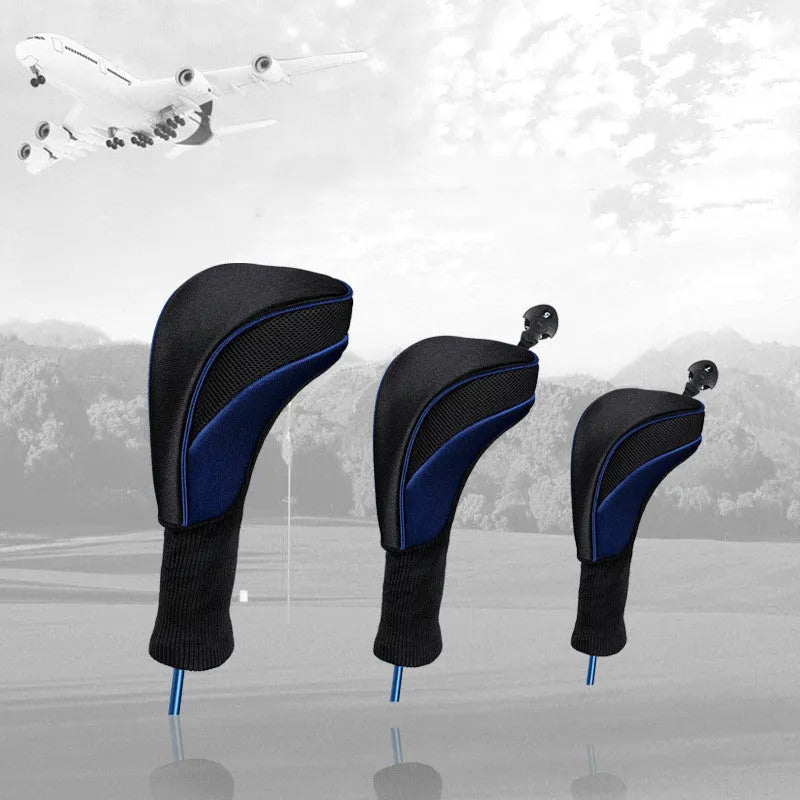 Set of six fabric golf club covers in blue, black, red, and multi-colour designs laid out on grass