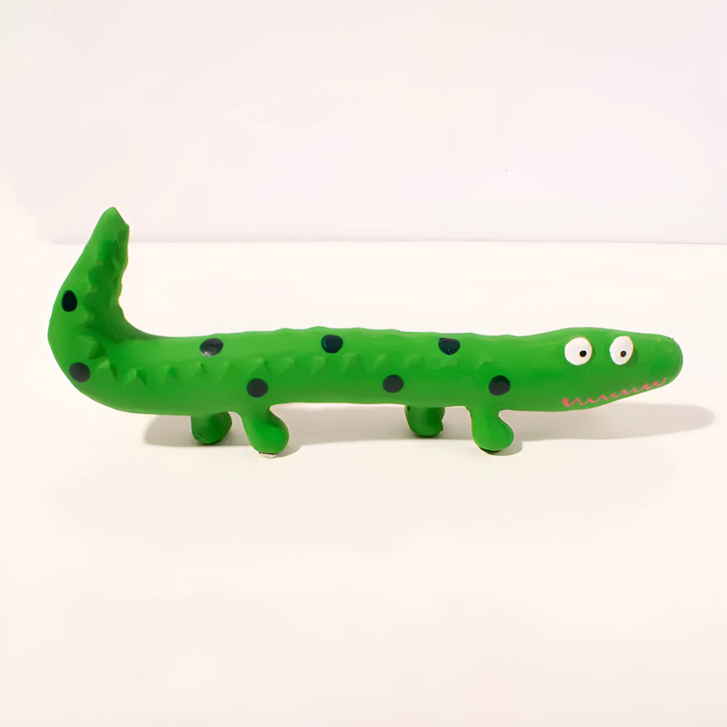 Green lizard-shaped dog chew toy with squeaker function for dental play