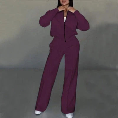 Women's two-piece activewear set with zipper jacket and wide-leg pants in various colors