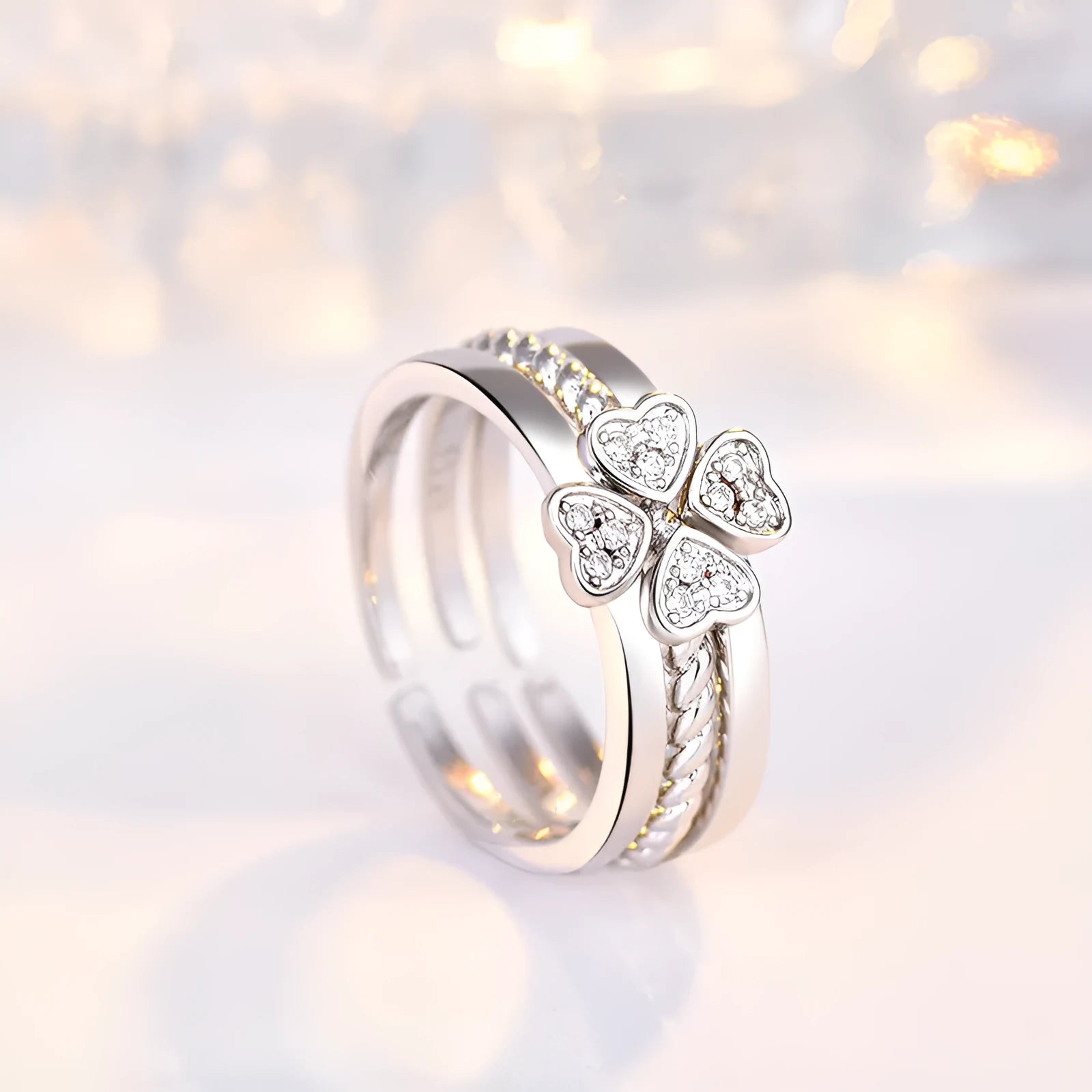 Four-leaf clover adjustable ring set for women with spinning top and zircon stones in white gold finish