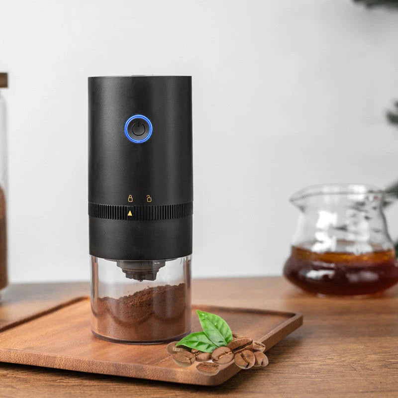 Portable electric coffee grinder with USB-C charging, adjustable grind settings, and dishwasher-safe removable bins