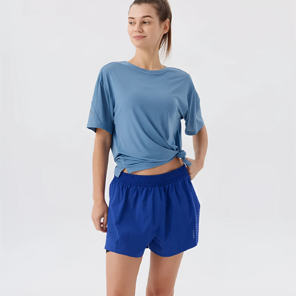 Men's straight-leg sports shorts with side slits in turmeric yellow colour
