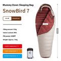 Goose down mummy sleeping bag shown with its compression storage bag.