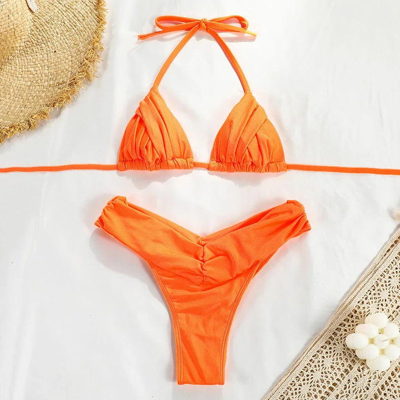 Women's solid colour pleated bikini swimsuit with high elasticity nylon fabric and removable padding