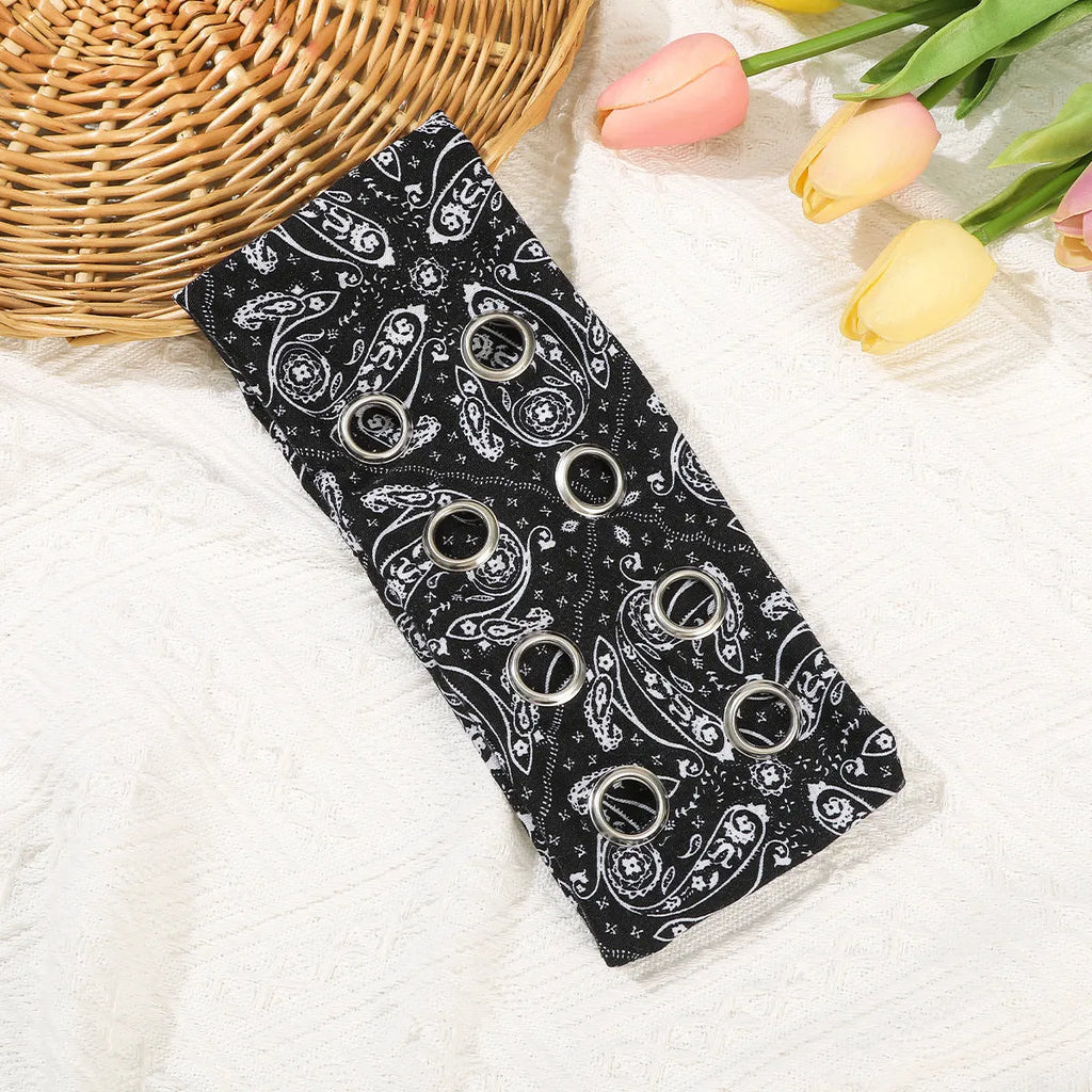 Punk style metal circle pullover hair band for exercise in multiple colour options.