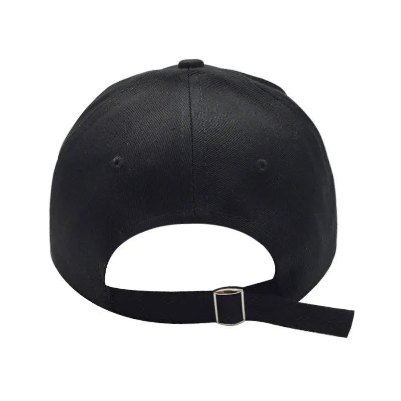 Alien head embroidered baseball cap in black with green label, cotton satin weave, side view