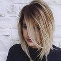 Short straight wig in gold colour, 16 inch length, on a mannequin head