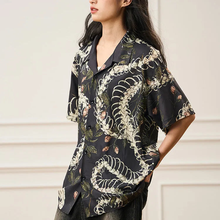 Short sleeve Cuban collar shirt with a snake bone pattern print in a loose fit.