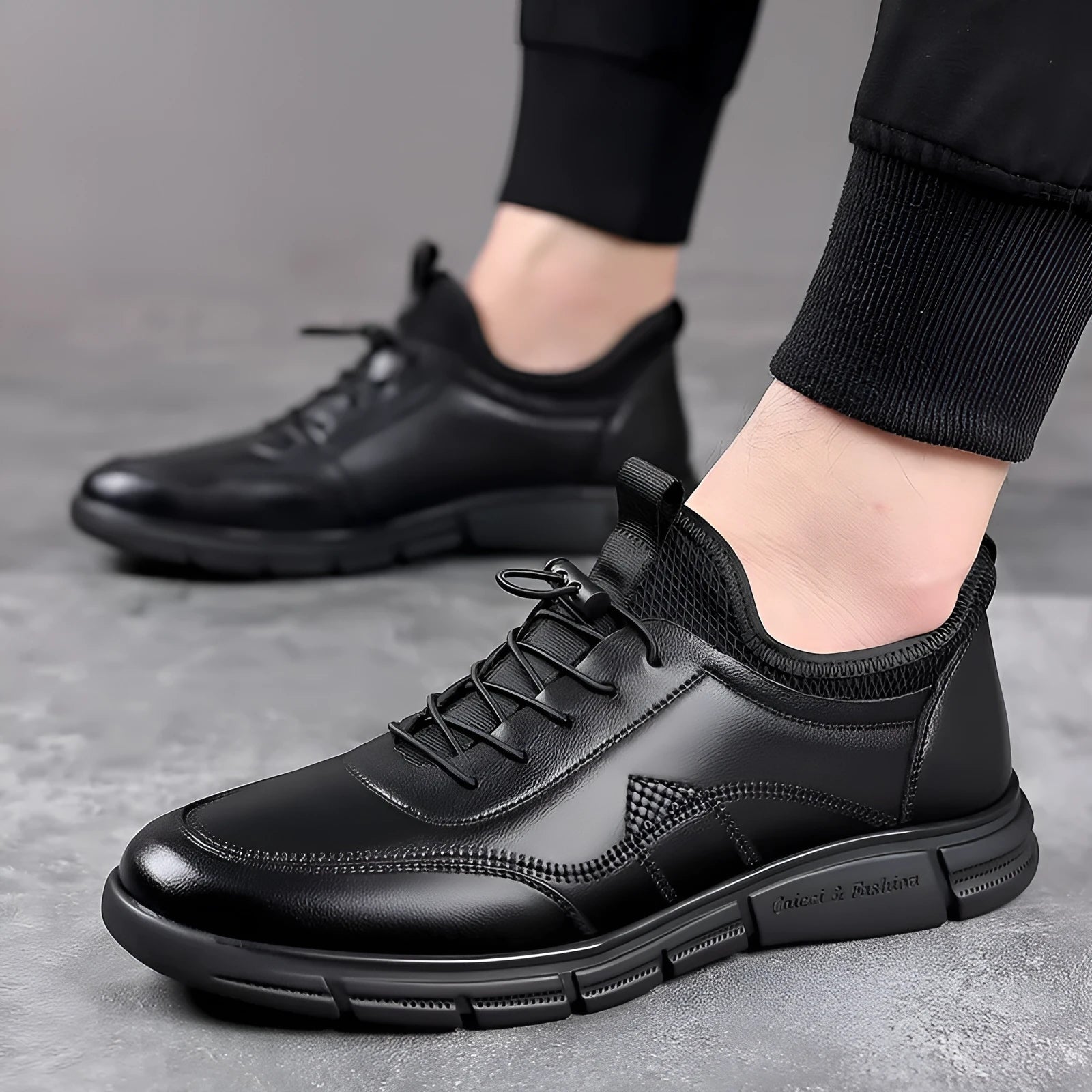 Black men's casual leather shoes with a round toe, square low heel, and a stitched leather upper on a rubber sole.