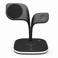 Black 3-in-1 desktop wireless charger stand showing phone, headphones, and watch on their respective charging pads.