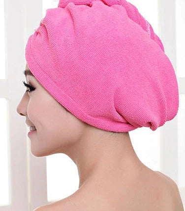 Absorbent microfiber hair turban in various vibrant colours, designed for fast and convenient drying