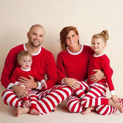 Family striped Christmas pajamas in cotton, available in red and white or green