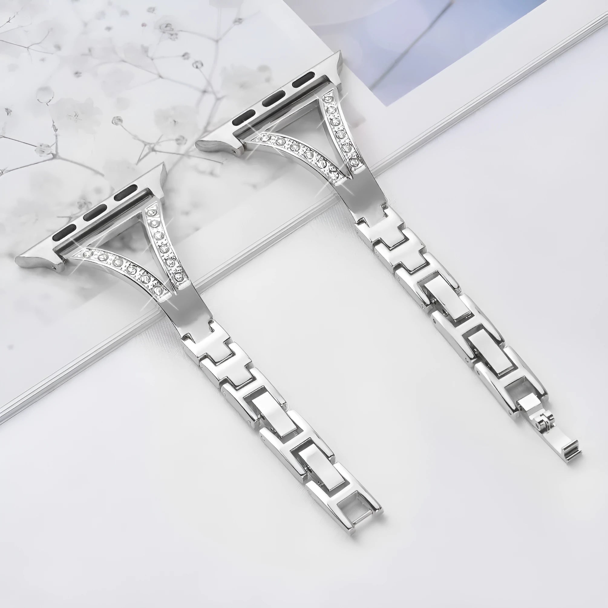 Herringbone pattern smart watch strap for Apple Watch in silver, showing zinc alloy lugs.