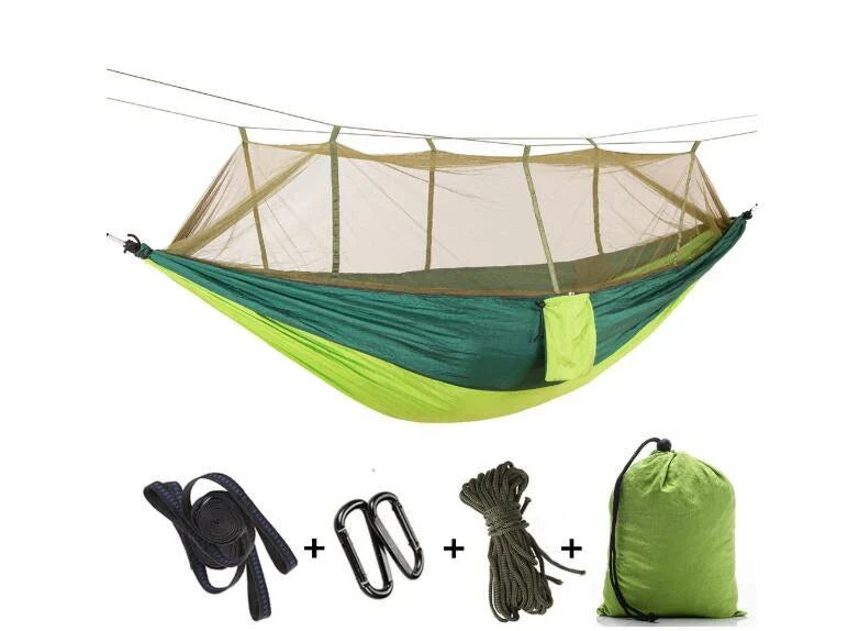 Parachute hammock with mosquito net in various colors and sizes, ideal for outdoor adventures and relaxation