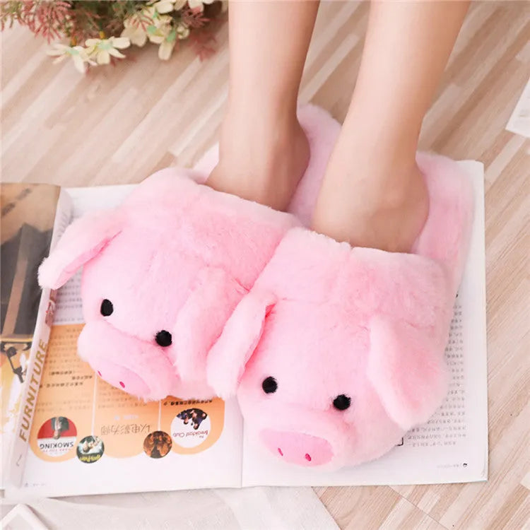 Pink pig-themed floor slippers with short plush exterior.