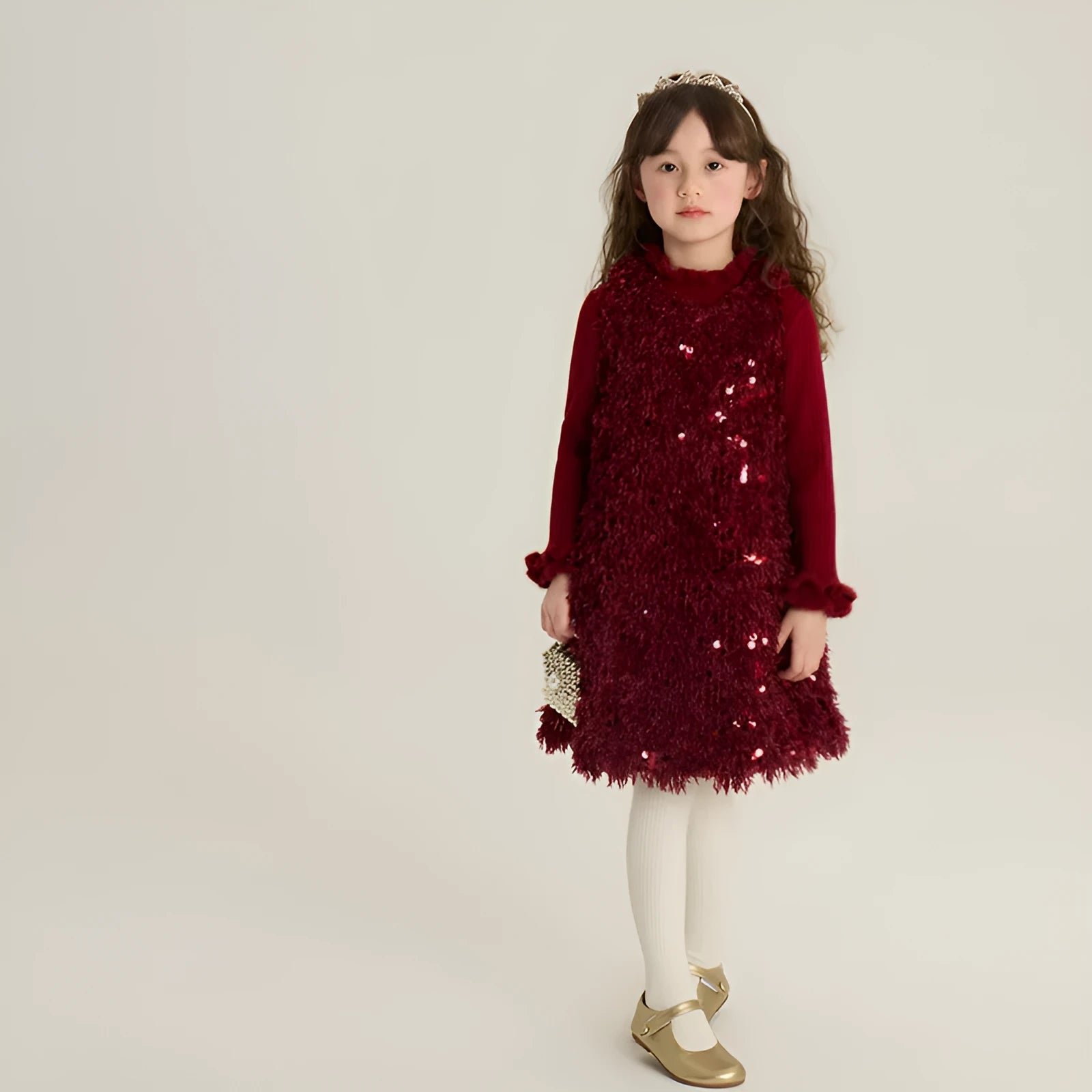 Red winter cotton padded sequin girls vest dress set with matching sweater on child model