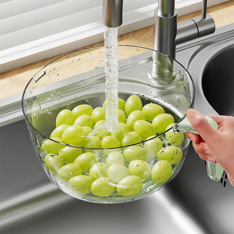 Multifunctional kitchen drainage basin in light green and white for efficient fruit and vegetable washing
