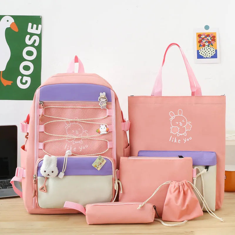 Lightweight large capacity student backpack in nylon, showing curved shoulder straps and solid colour options.