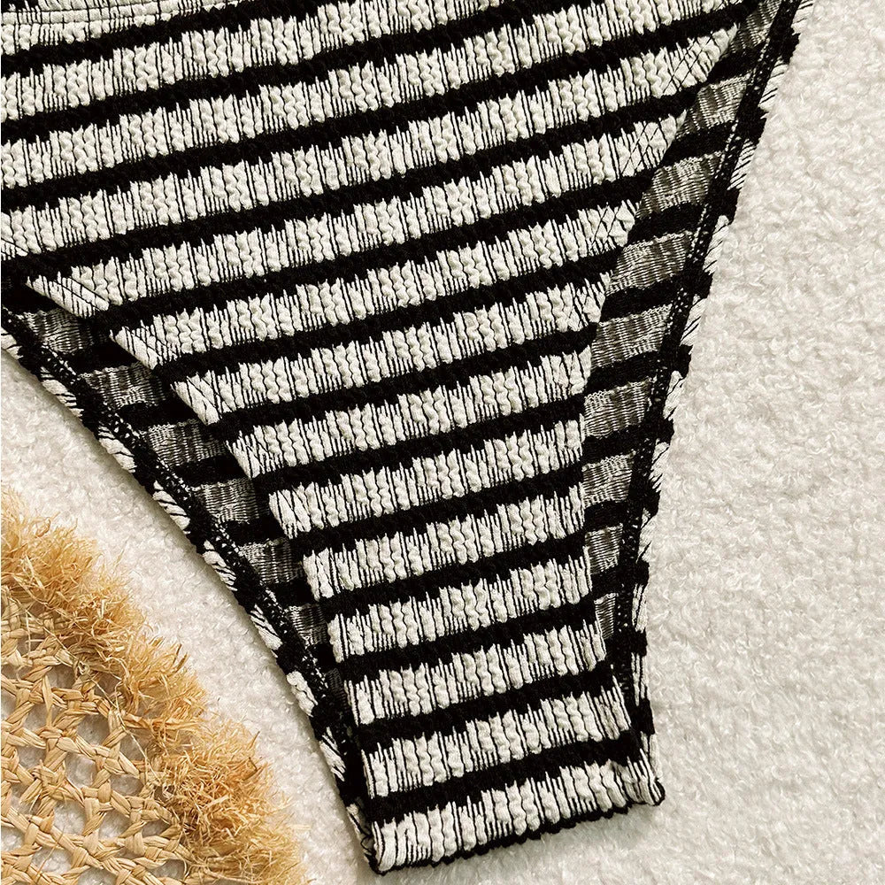 Women's striped bikini swimsuit with brief bottoms in pink or black colours