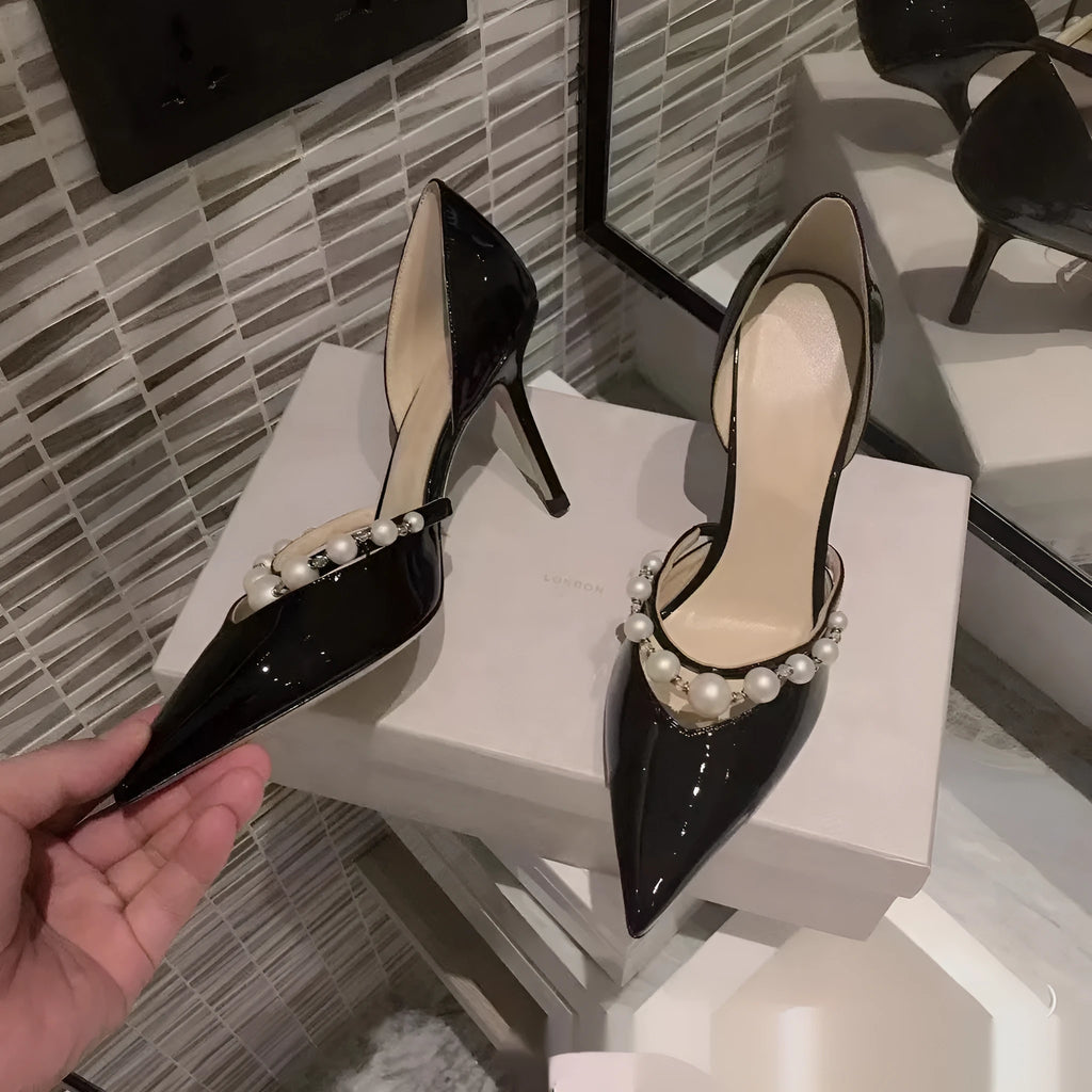 Women's black pointed patent leather high heel stiletto shoes with pearl decoration