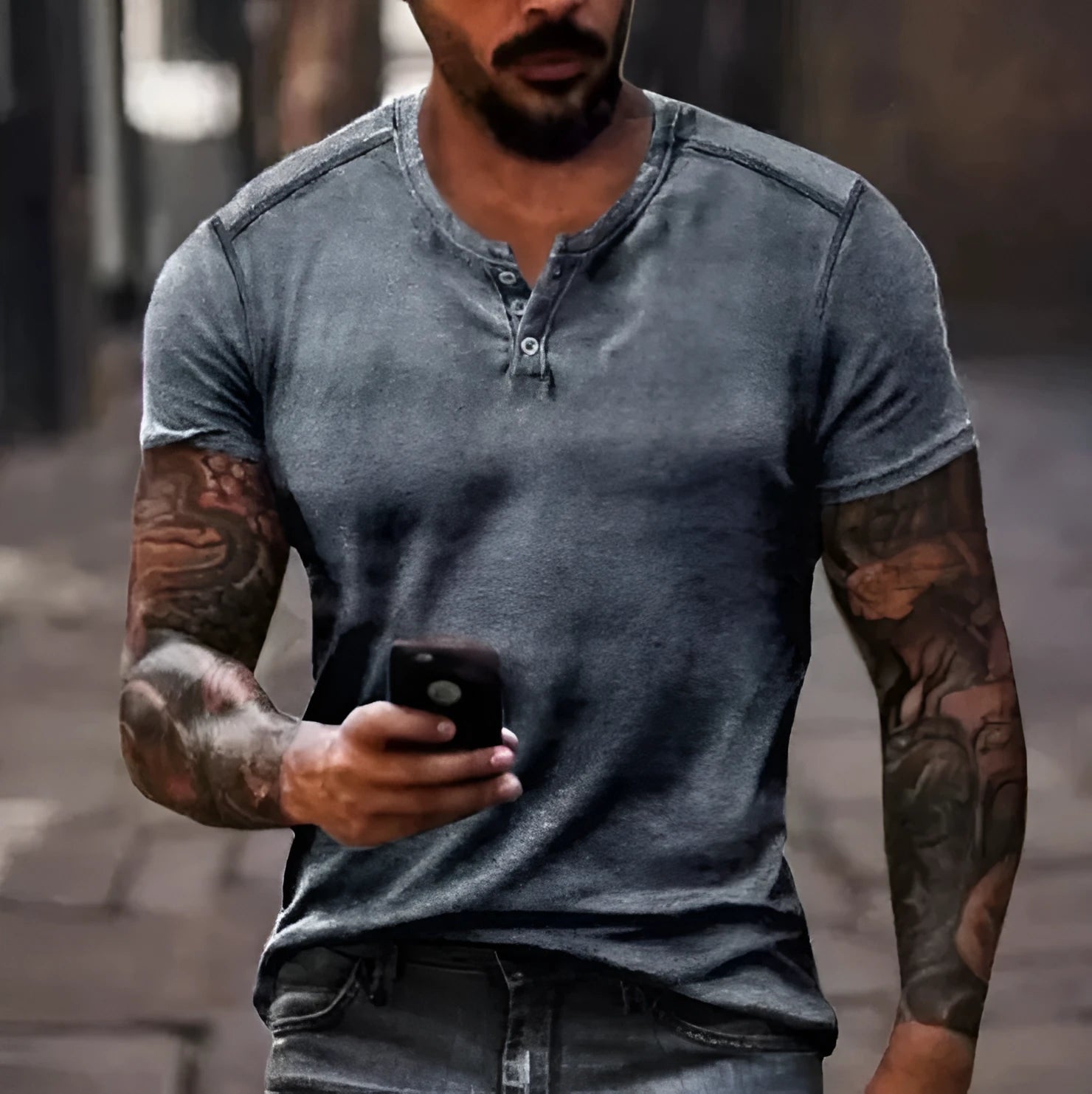 A man's short sleeve polo shirt in bird eye cloth with a simple lapel and button front, shown in a colour matching pattern.