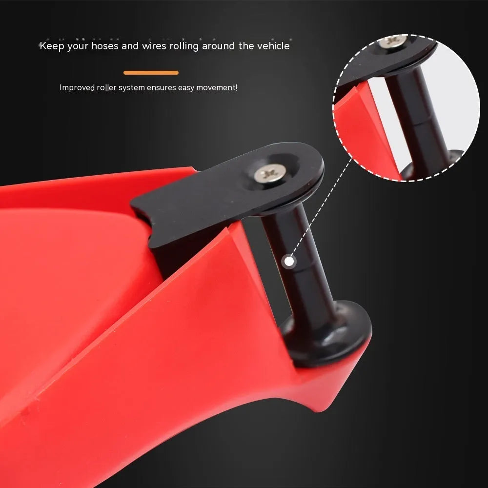 Four red plastic triangular parking blocks for car tyre stopping and vehicle positioning