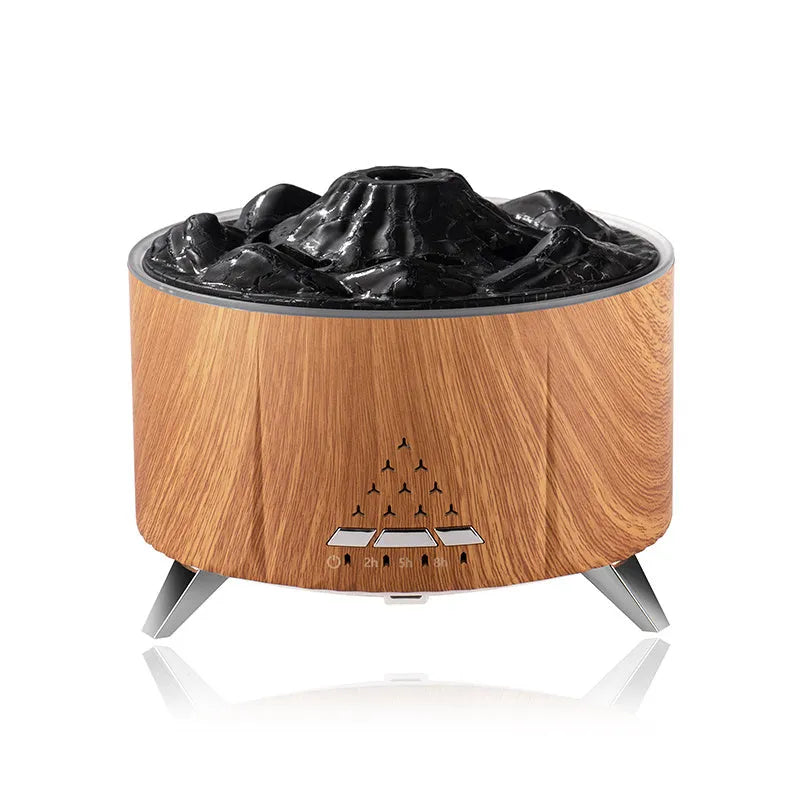 White portable simulated flame ultrasonic aromatherapy air humidifier with remote control on a table
