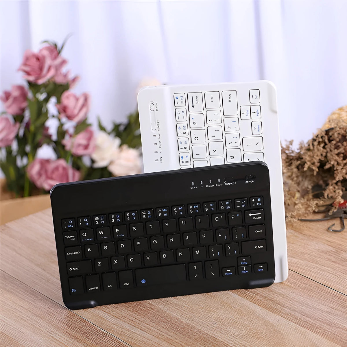 Wireless Bluetooth mini ultra-thin keyboard for laptop, available in black and white, with plug-and-play support