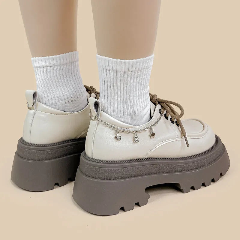 White XINGX Bear colour platform Mary Jane shoes with thick chunky heel and front lace-up.