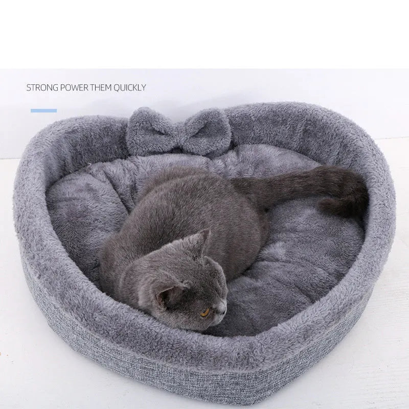 Heart-shaped pet nest for cats or small dogs made of linen and Arctic wool available in grey and pink in three sizes