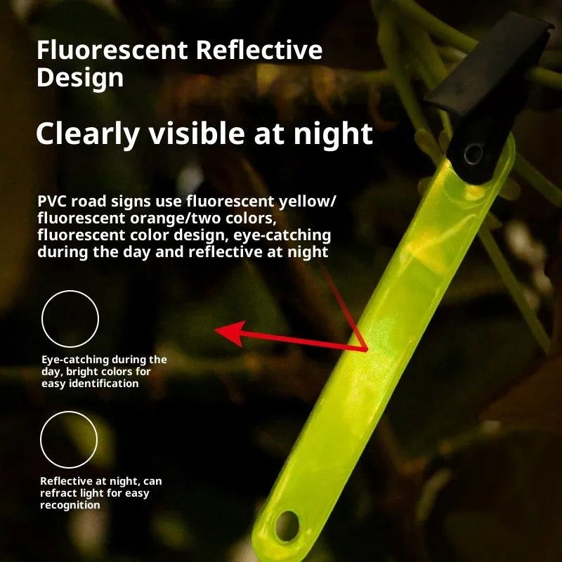 Yellow PVC road sign clip for archery target ribbon marking, size 10.3 cm, on a range background