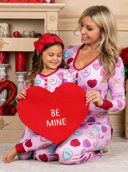 Valentines Day family pajamas with a cozy heart print design for parents and children