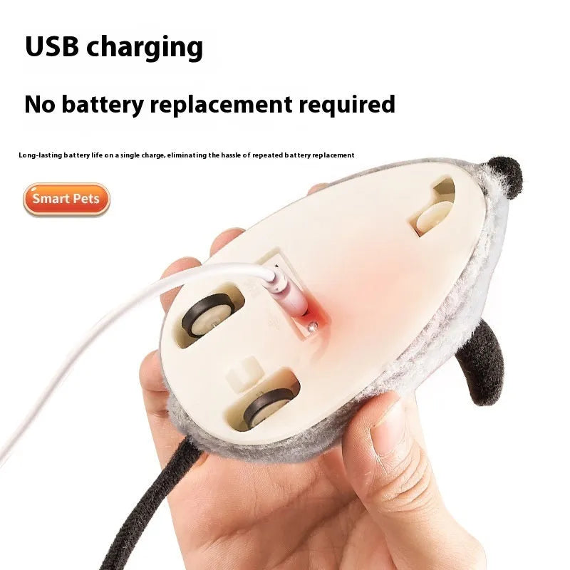Grey electronic cat toy mouse with feather tail decoration and charging cable