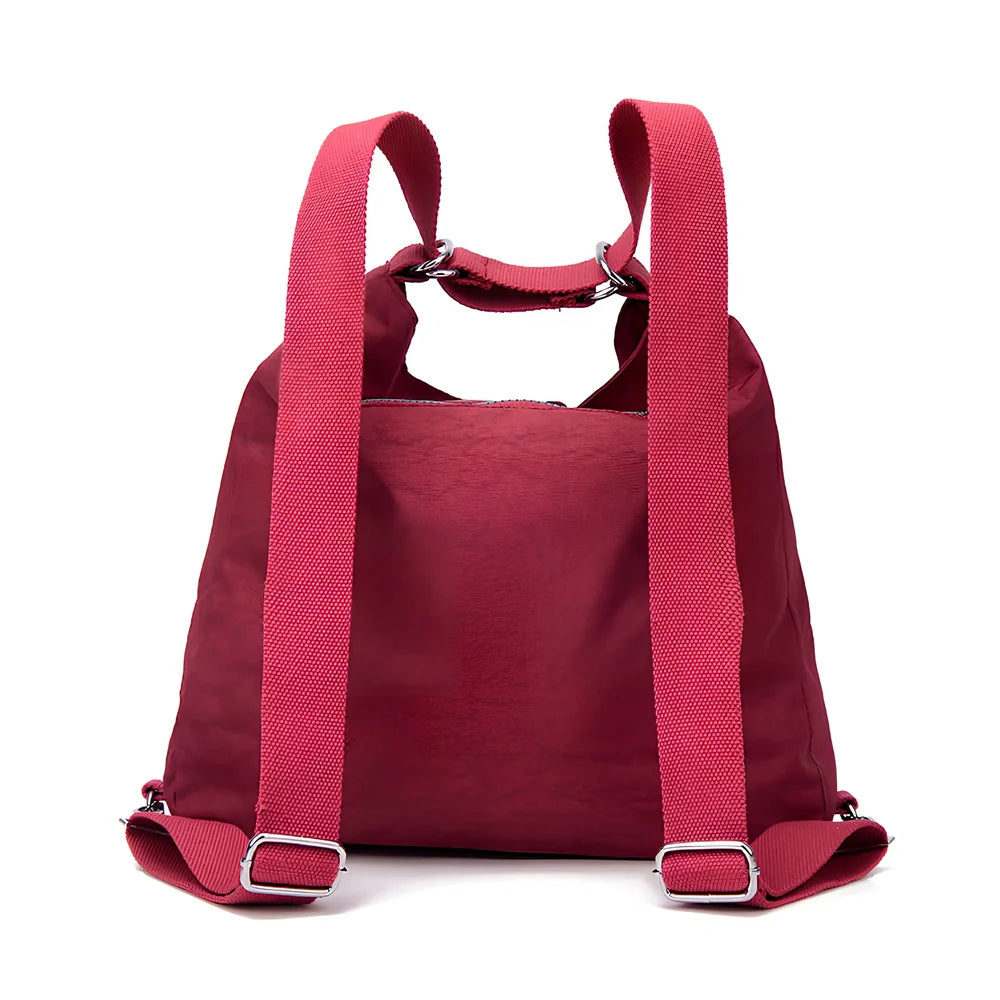 Women's waterproof nylon crossbody bag with organizational pockets and 34cm laptop capacity