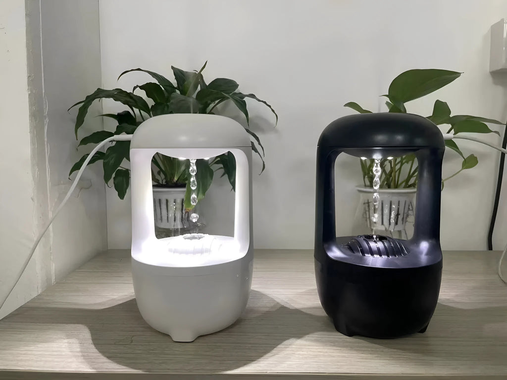 Anti gravity humidifier water drop backflow with 500ml white ABS body and black base on a desk