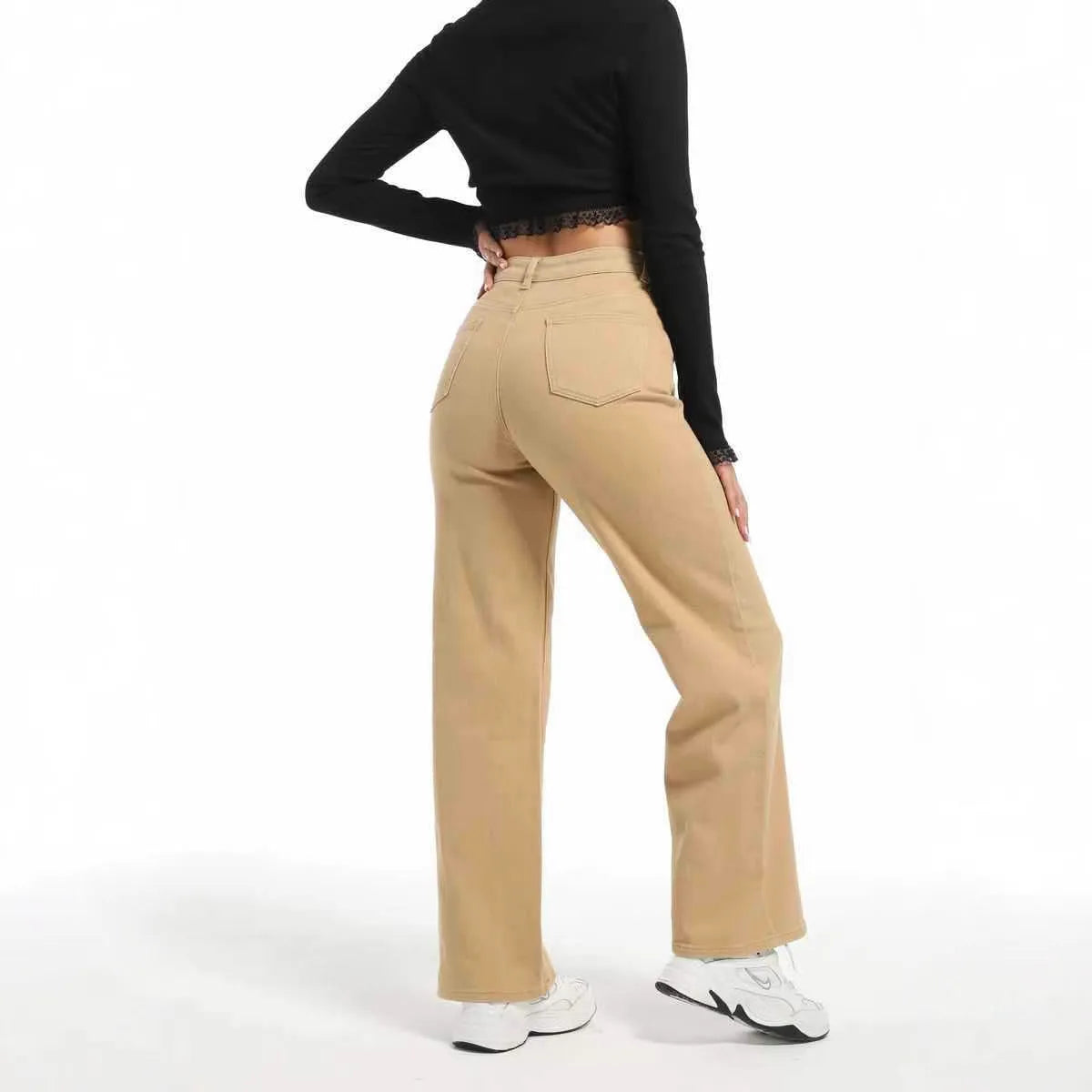 Women's straight leg jeans in apricot colour with high waist and wide leg trousers cut