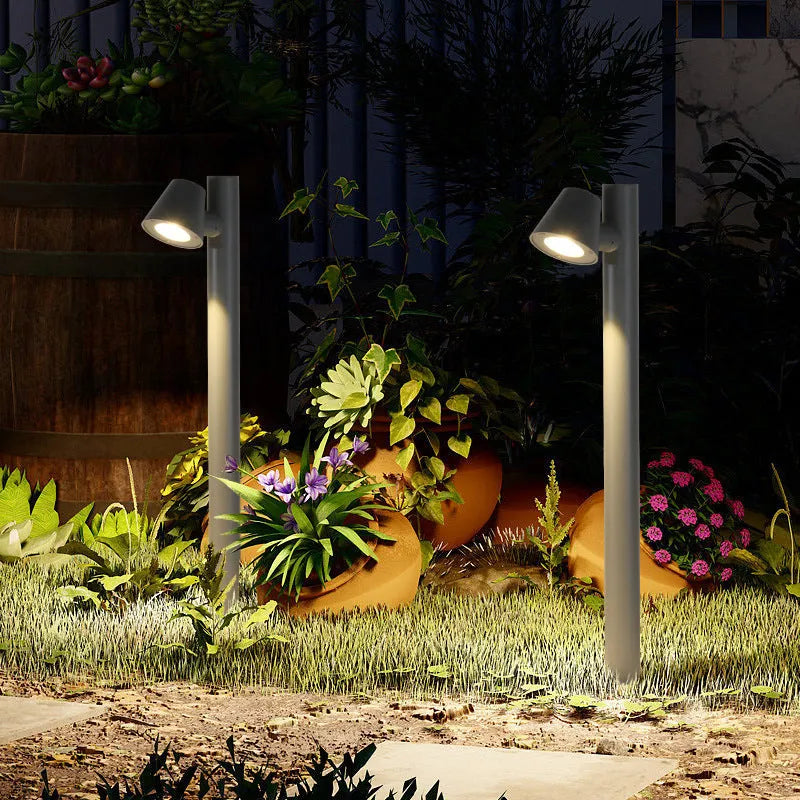Minimalist IP65 die-cast aluminium LED outdoor lawn lamp in garden setting, single head column light