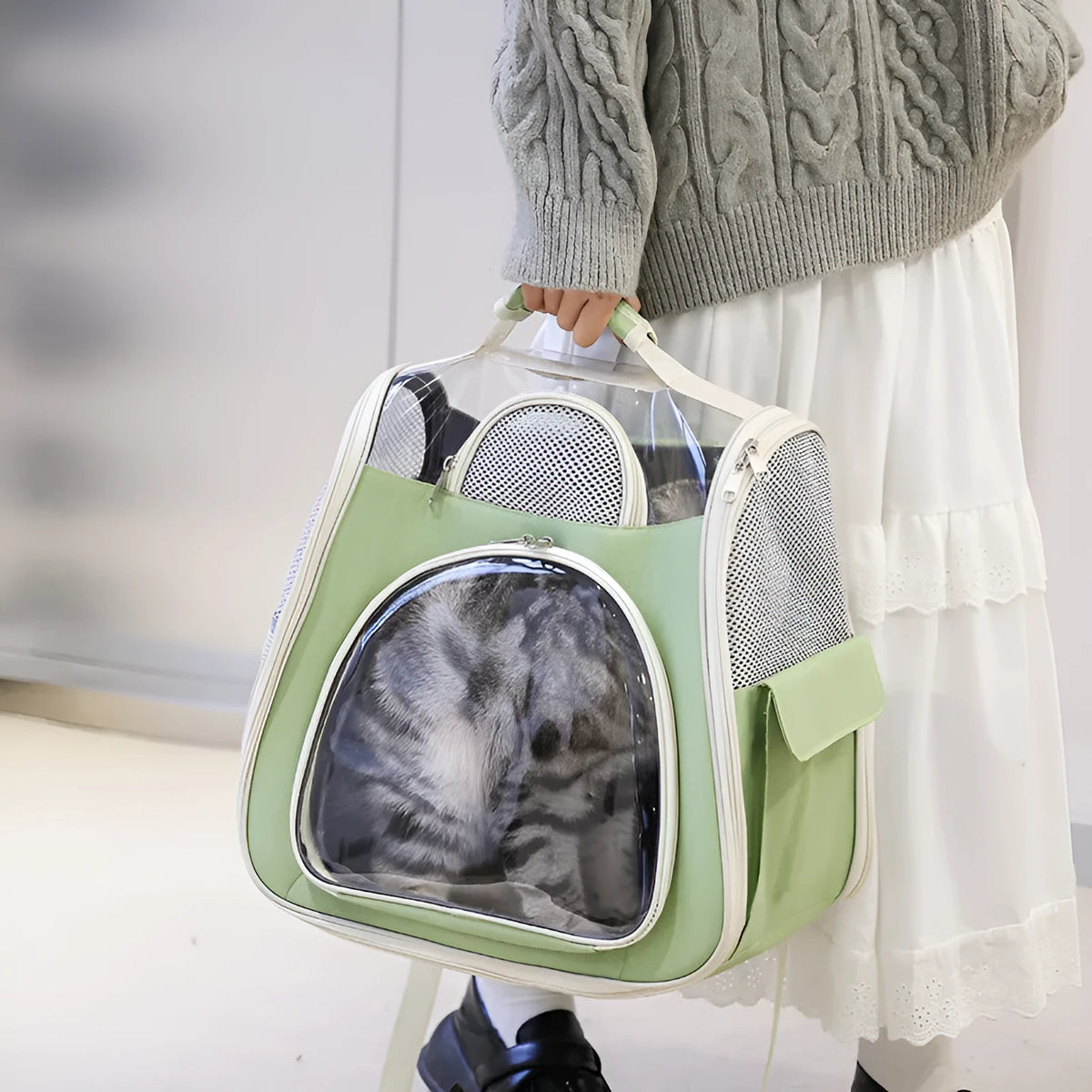 Portable foldable pet bag in blue solid colour, medium capacity, made from PU and PVC materials