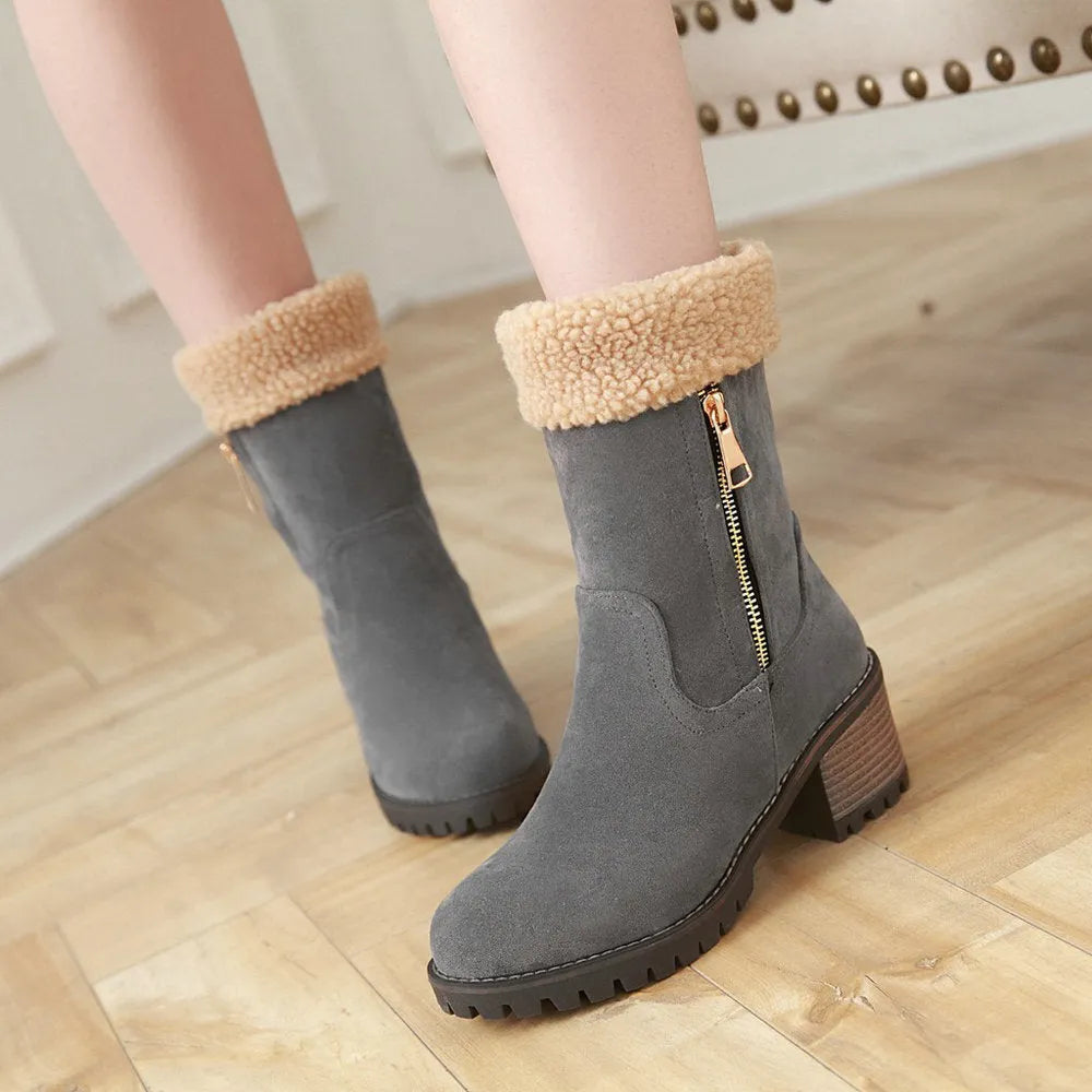 Ankle-high snow boots with plush lining and rubber insole in black, grey, green, and orange colours.
