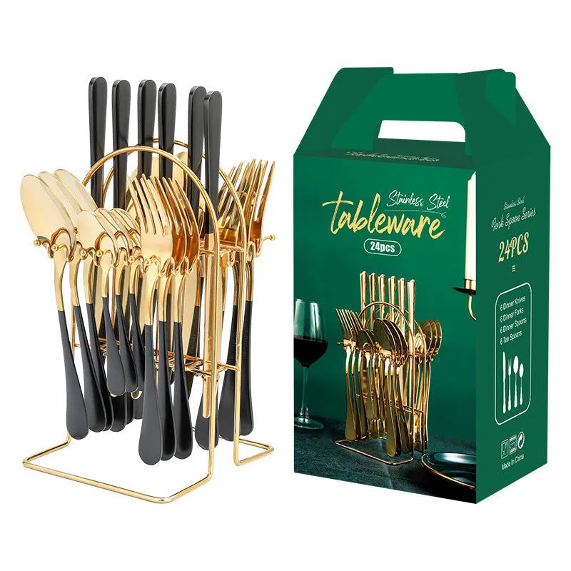 24-piece stainless steel cutlery set with storage rack in gold finish showing knives, forks, spoons