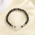 Natural obsidian cat couple bracelet with electroplated silver finish showing cat modelling detail