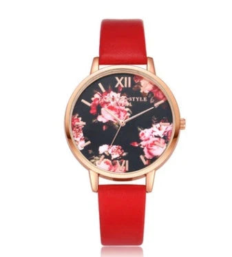 Rose gold women's watch with leather strap and love heart design