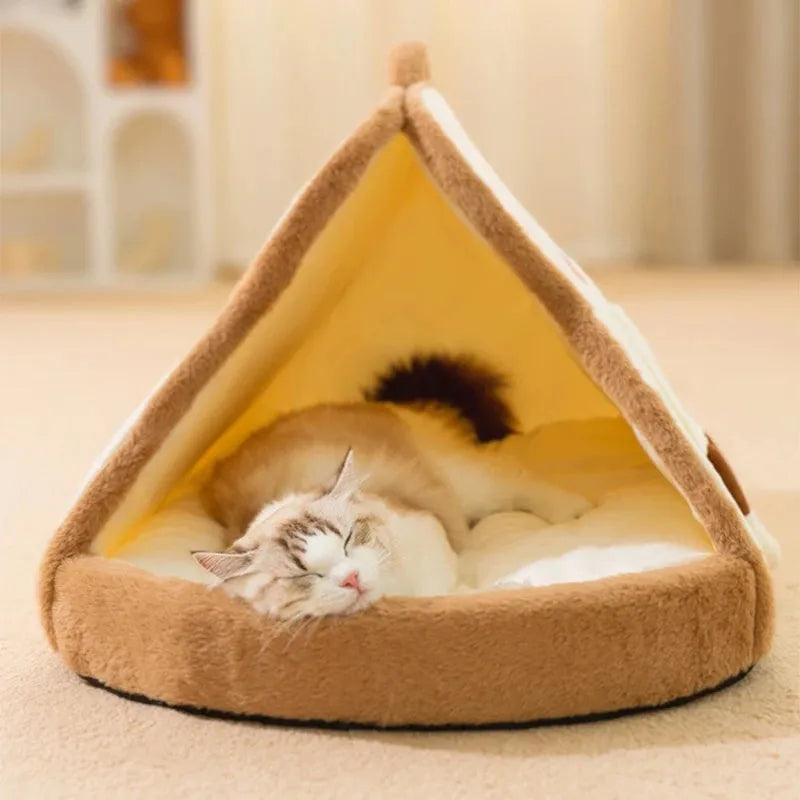 Green insulated cat tent pet bed with fleece blanket, shown in a home setting.