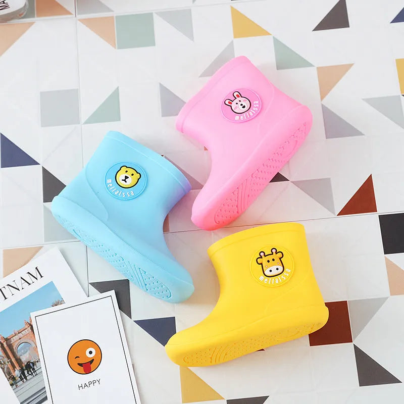 Children's short non-slip waterproof PVC rain boots in cartoon colours, yellow pink and blue options