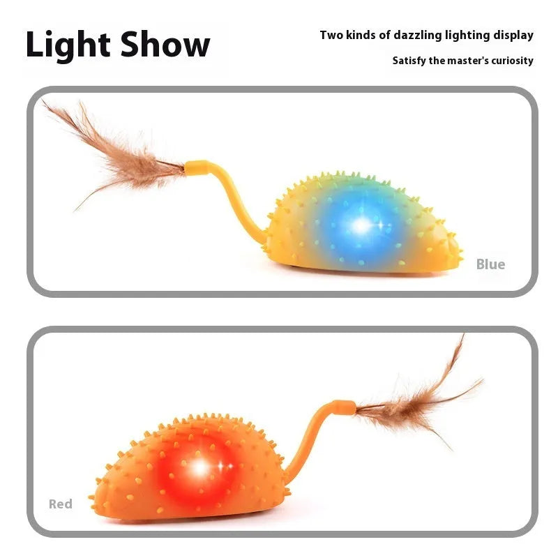 Remote control and USB-rechargeable silicone mouse cat toy in cyan colour with attached feathers.
